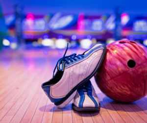 bowling ball and shoes in a bowling lane